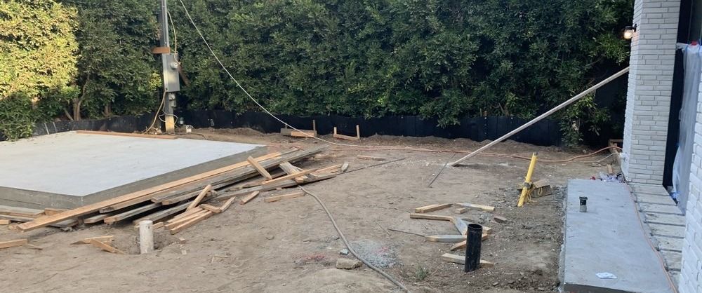 Santa Monica remodel — rear yard with slab poured ahead of landscaping, under construction